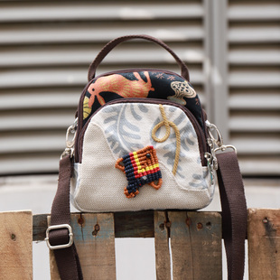 新款民族风斜挎女k士包零钱迷你编织单肩包百搭手机包超轻便小包