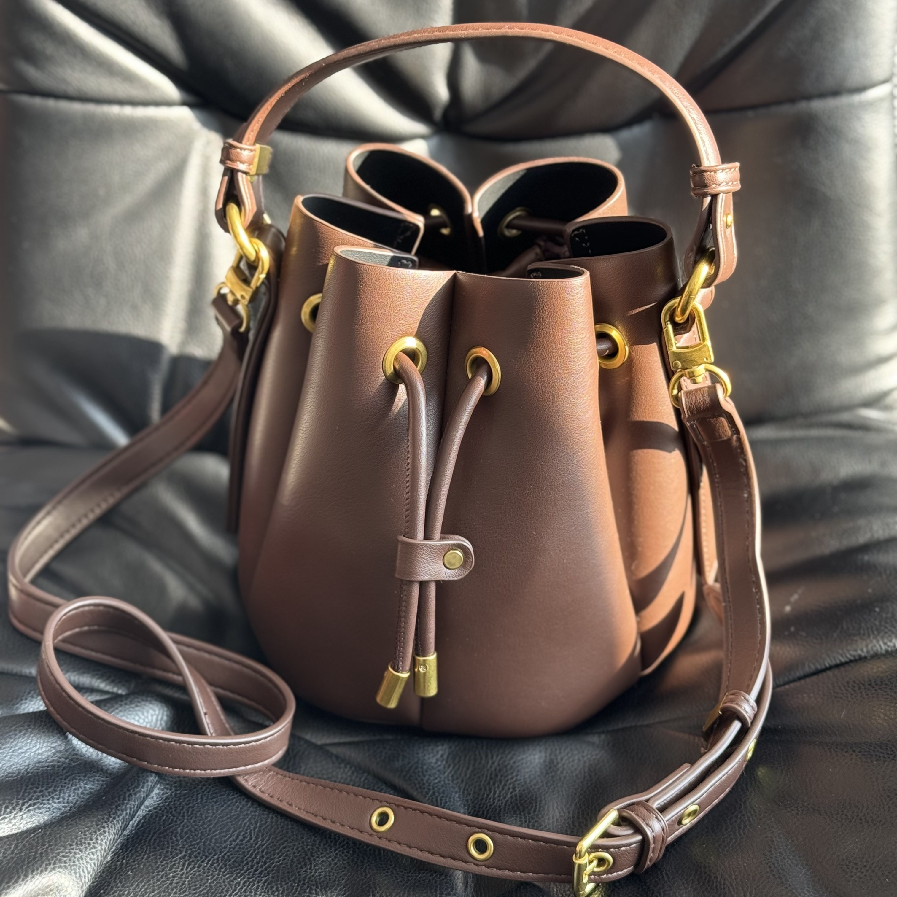 INFINITE COASTLINE/无垠海岸春晓4217花瓣水桶包（可斜挎）,箱包皮具/热销女包/男包,水桶包,淘宝优惠券,粉丝福利购,淘宝优惠卷