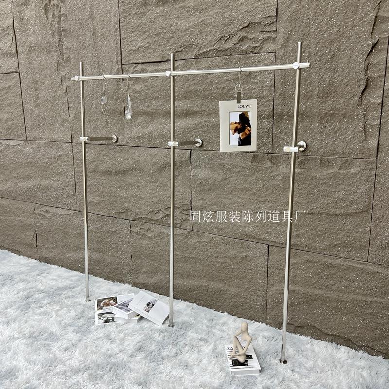 服装店展示架创意简约极简不锈钢落地壁挂式上墙架靠墙陈列挂衣架