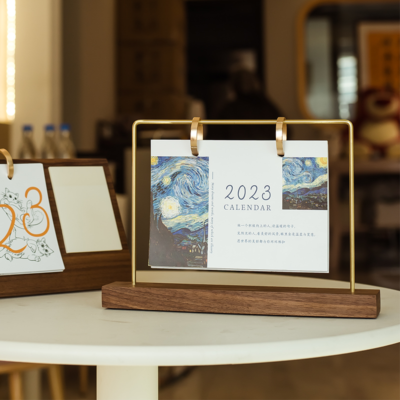 2023年台历实木创意桌面摆件定制企业广告设计日周月兔年挂历订做