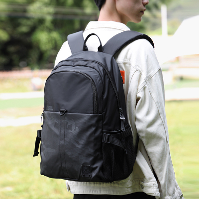 男士背包商务旅行双肩包男高中生大学生书包休P闲大容量电脑包新