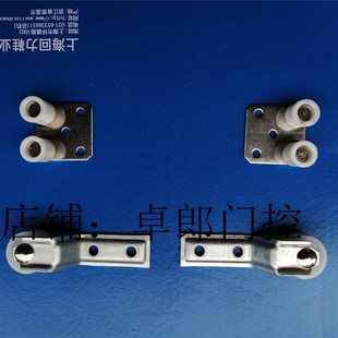 卷闸门滑轮 导向轮车库门拉固定配件塑料  电动卷帘门导向轮 轮子