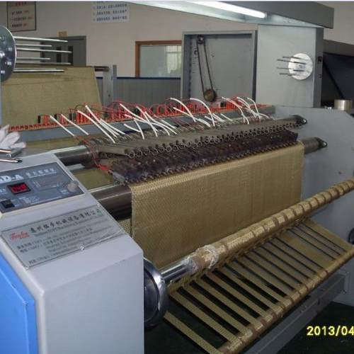 供应新型热切分条机凉席包边条床裙布料热切 变频调速光电齐边