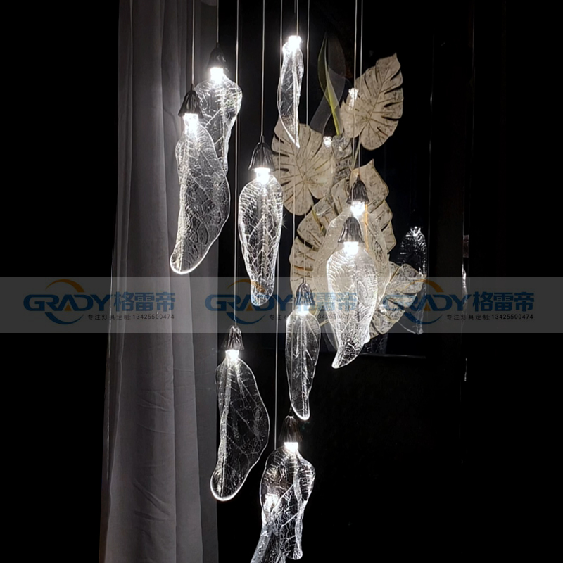 设计师轻奢别墅客厅跃层复式楼梯LOFT现代简约透明树叶片水晶吊灯