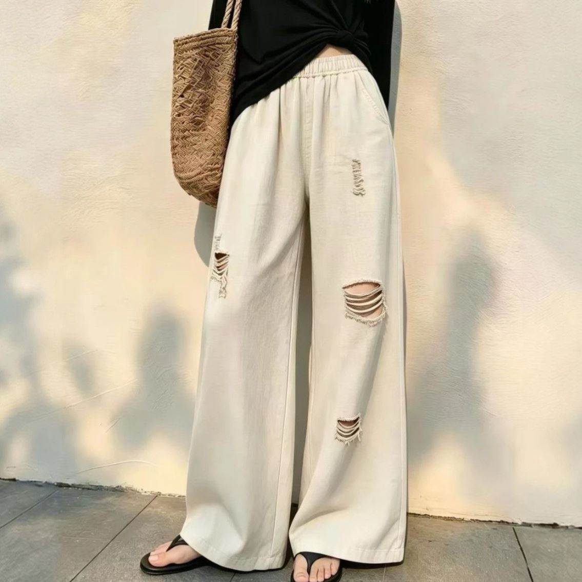 绿色破洞休闲拼接阔腿裤女2026夏季新款宽松显瘦慵懒高级感直筒裤
