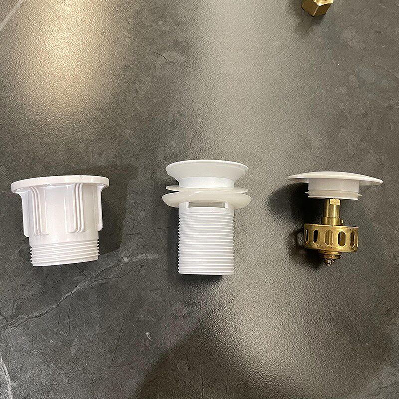 全铜白色弹跳式下水器微晶石陶瓷盆一体防臭下水管
