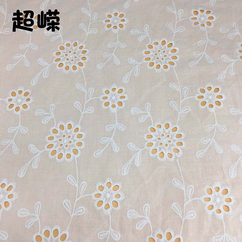 春夏 落英缤纷棉布打p孔绣花布 镂空刺绣面料 衬衫家居服 供应
