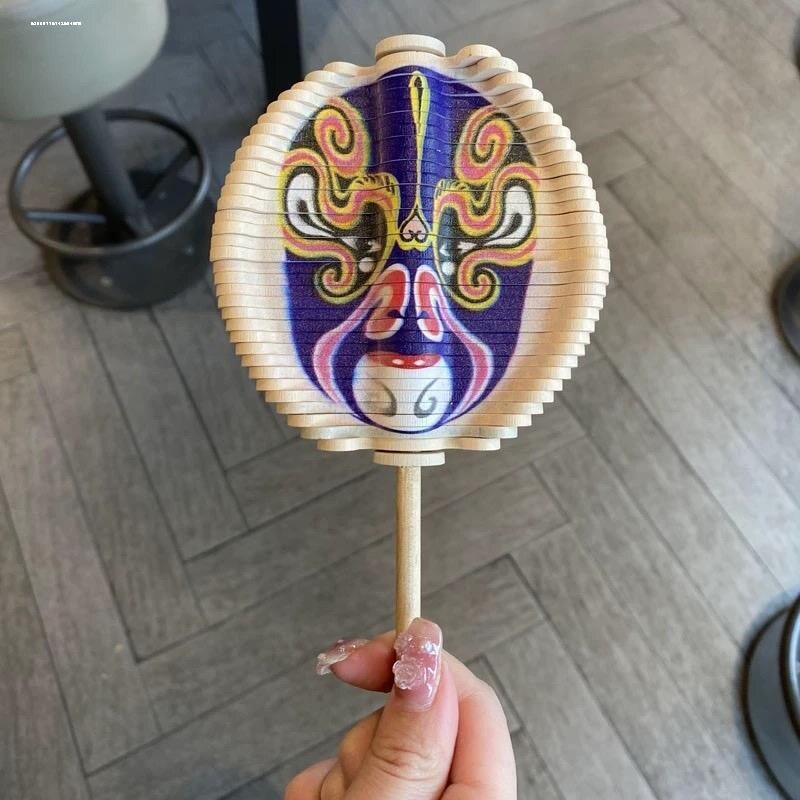 网红新款斐波那契螺旋树木质旋转手摇脸谱玩具解压变脸棒棒糖陀螺