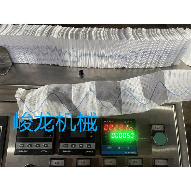 带X光止血棉片折叠机带加液烘干壳聚糖止血纱布折叠机制造
