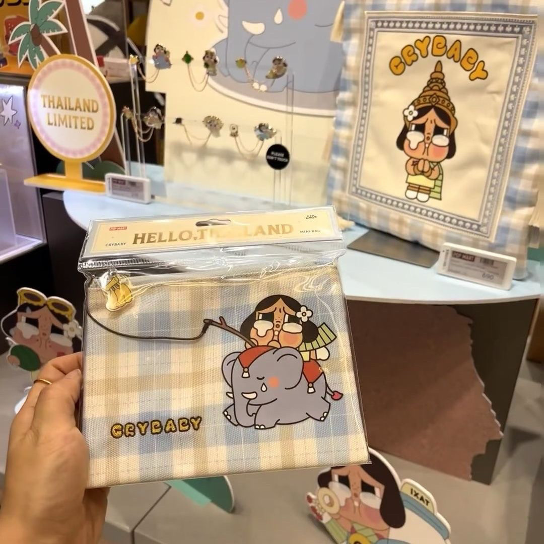 泰国限定cry baby哭娃收纳包可爱零钱包新款便携式迷你旅行收纳袋
