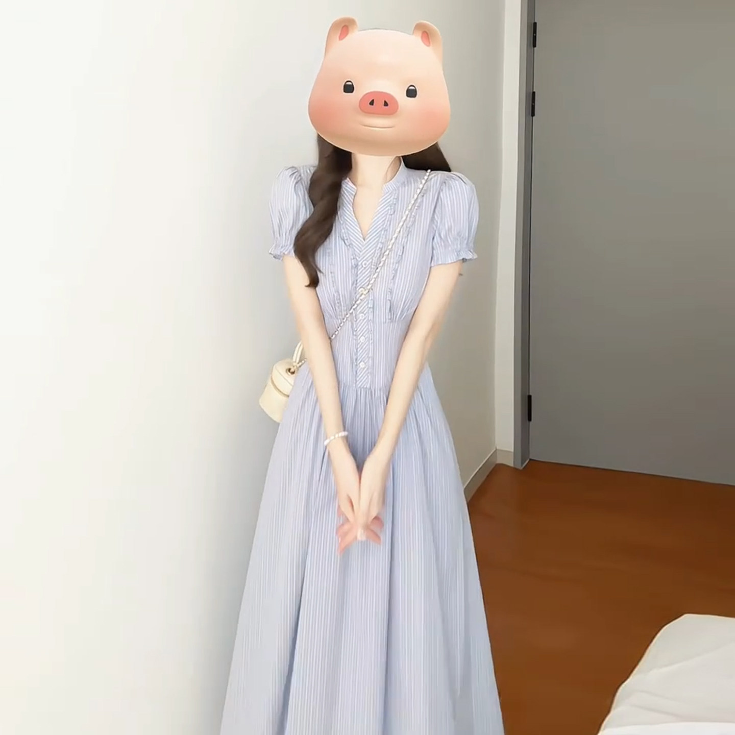 韩系温柔风蓝色条纹连衣裙子女夏季2026新款木耳边气质绝美a字裙
