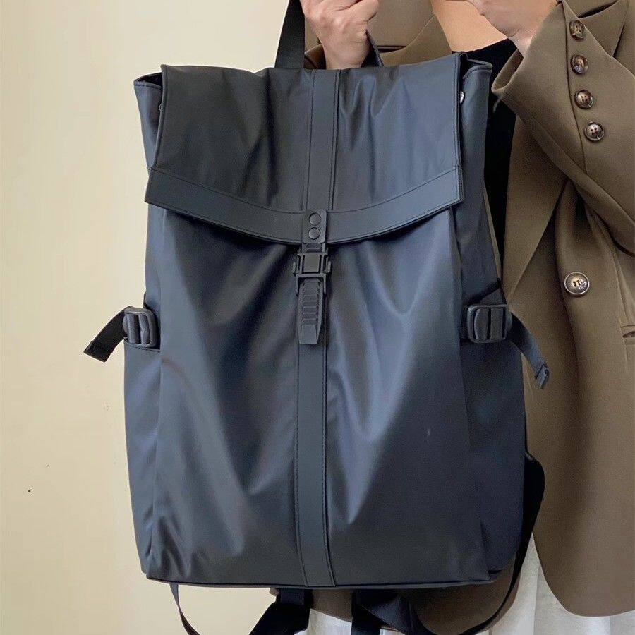 大容量通勤双肩包男电脑商务包大学生旅行背包女黑色高级感手提包