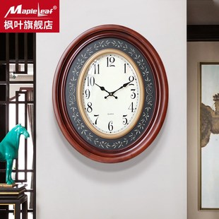 家用实木轻奢简约挂钟客厅潮流现代大气椭圆装 枫叶钟表欧式 饰时钟