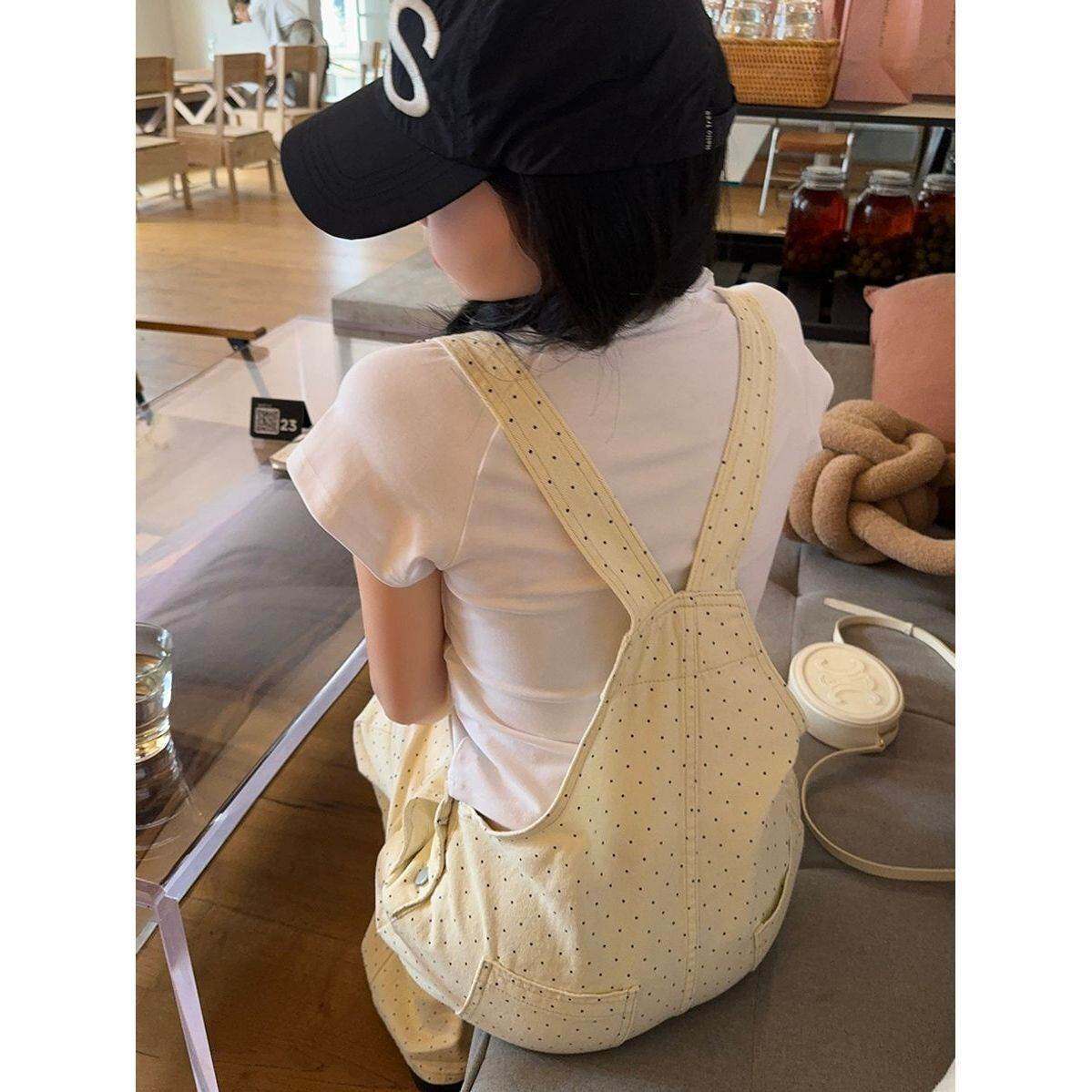 秋冬浅杏色甜美减龄背带裤波点高腰阔腿牛仔裤女新款宽松显瘦长裤