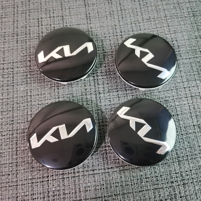 适用于起亚新款车标k2k3k4秀儿秀尔前中网机盖标后车标轮毂盖套标