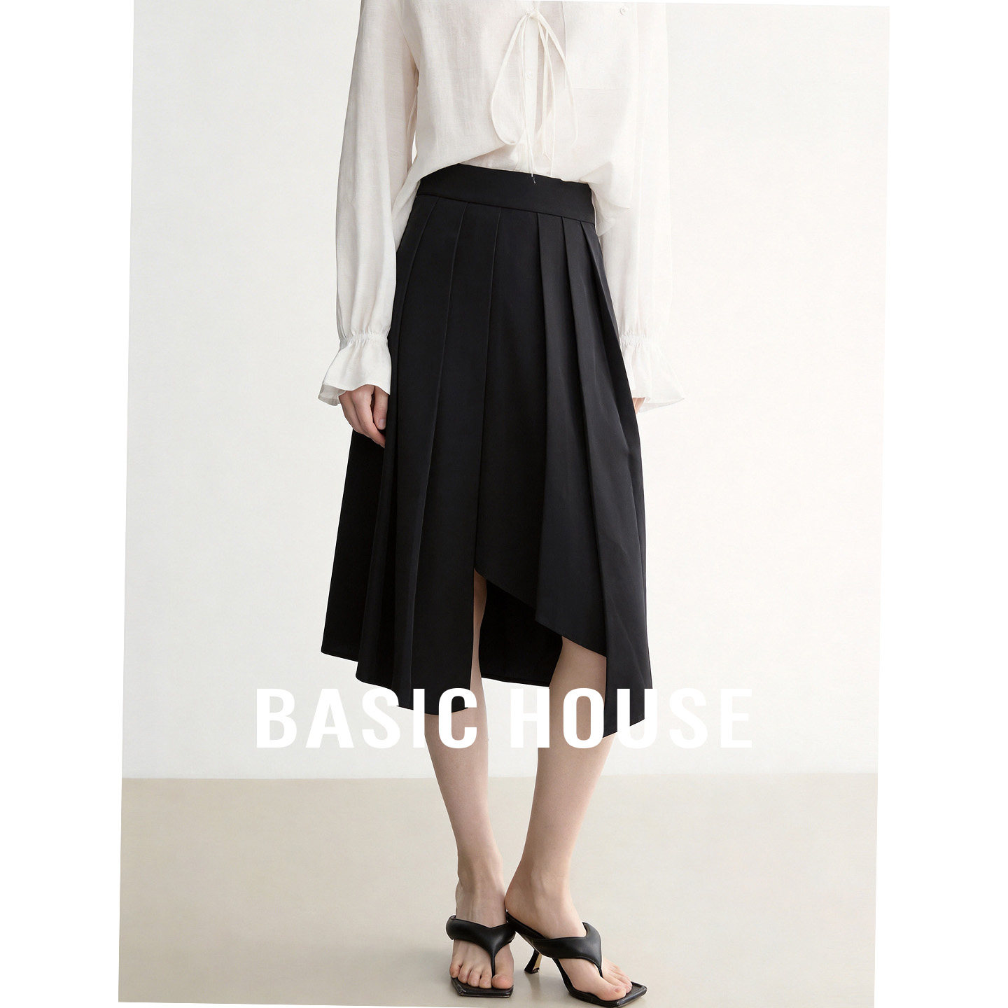Basic House/百家好黑色不规则A字半身裙女气质高腰中长款百褶裙
