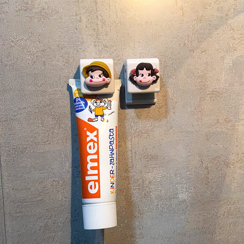 卡通牙膏置物架强力免打孔洗面奶壁挂夹收纳浴室可爱固定器牙膏夹