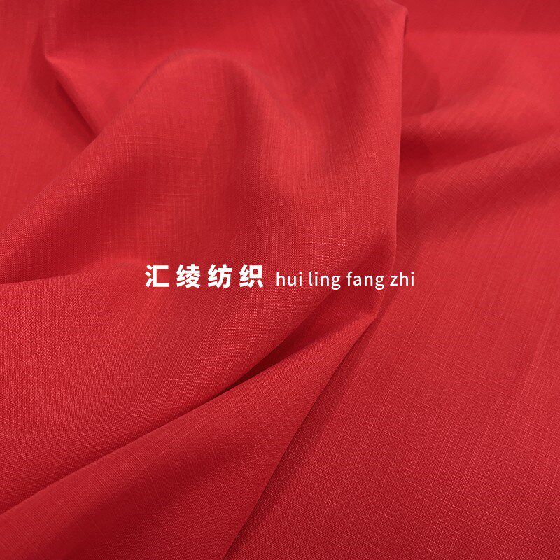 亚麻纹梭织砂洗霜感纯棉布料夏季红色棉布垂服装衬衫裙子汉服面料