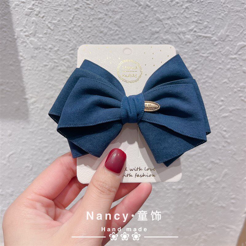 高级感秋冬款蓝色鹿皮绒儿童蝴蝶结发饰弹簧夹女孩头饰顶夹简约