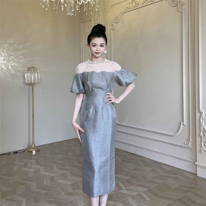 收腰中长款一字肩连衣裙设计感正式场合高级感显瘦简单大方小黑裙