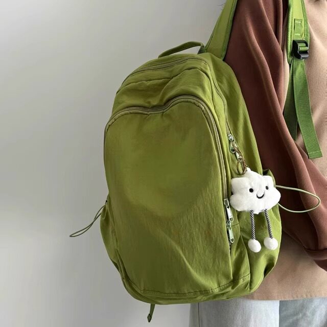 高颜值绿色书包初中女生ins小众简约双肩包高中生休闲旅行背包男