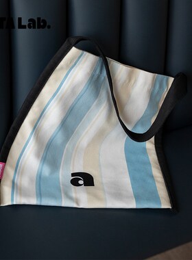 丸塔实验春夏新款双面背简约休闲帆布袋大容量通勤复古单肩包AI