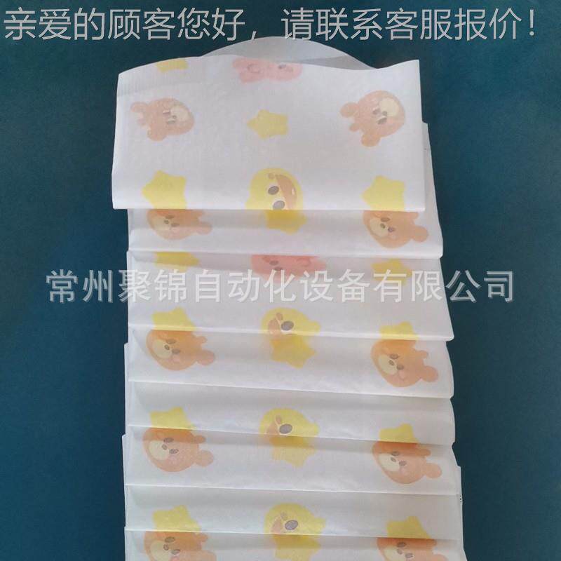 巾婴儿围兜机动化设备 次性口水折叠一机 带自背胶随意贴尺寸可调