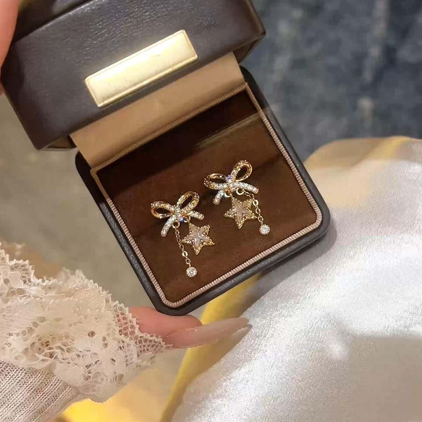 金色爆闪满钻蝴蝶结星星流苏耳钉