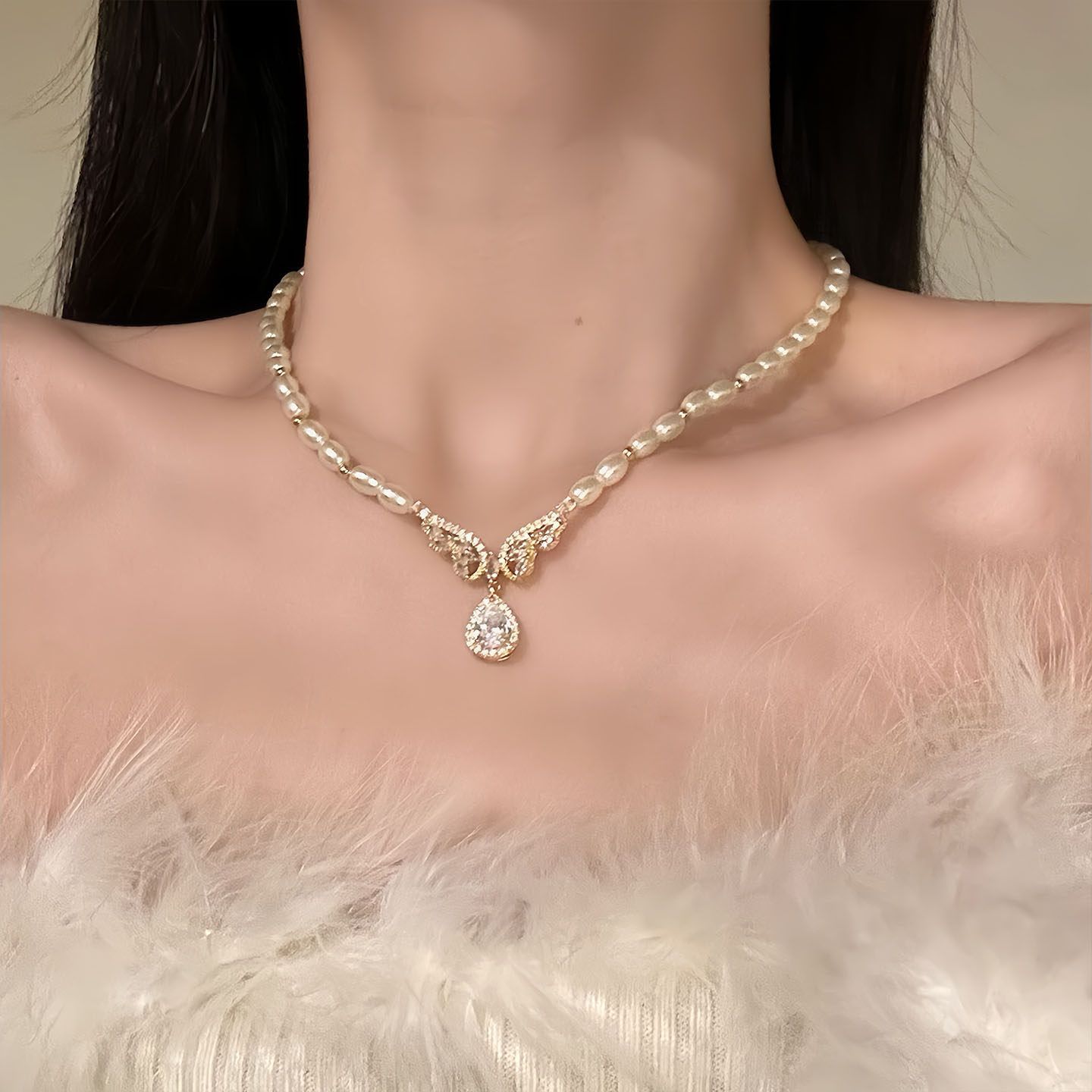天使泪痕珍珠翅膀吊坠毛衣链女