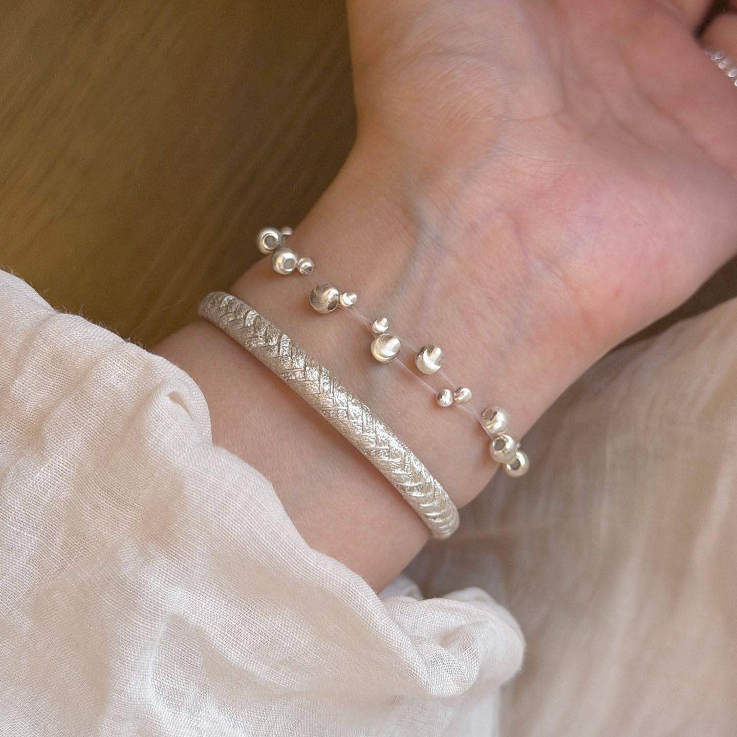 隐形鱼线猫眼串珠手链女款2026新款银色拉丝麦穗手镯中式叠戴手饰