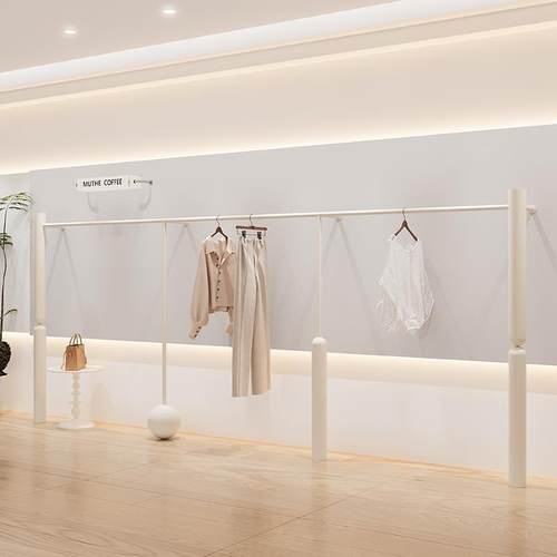 服装商店展示架壁挂式女装地板站立的创意货架儿童展示架温暖的奶