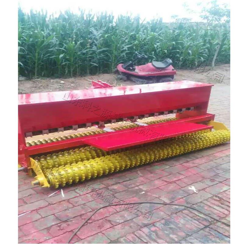 拖拉机悬挂草坪牵引式草籽点播机适用于各种地况的种子播种机