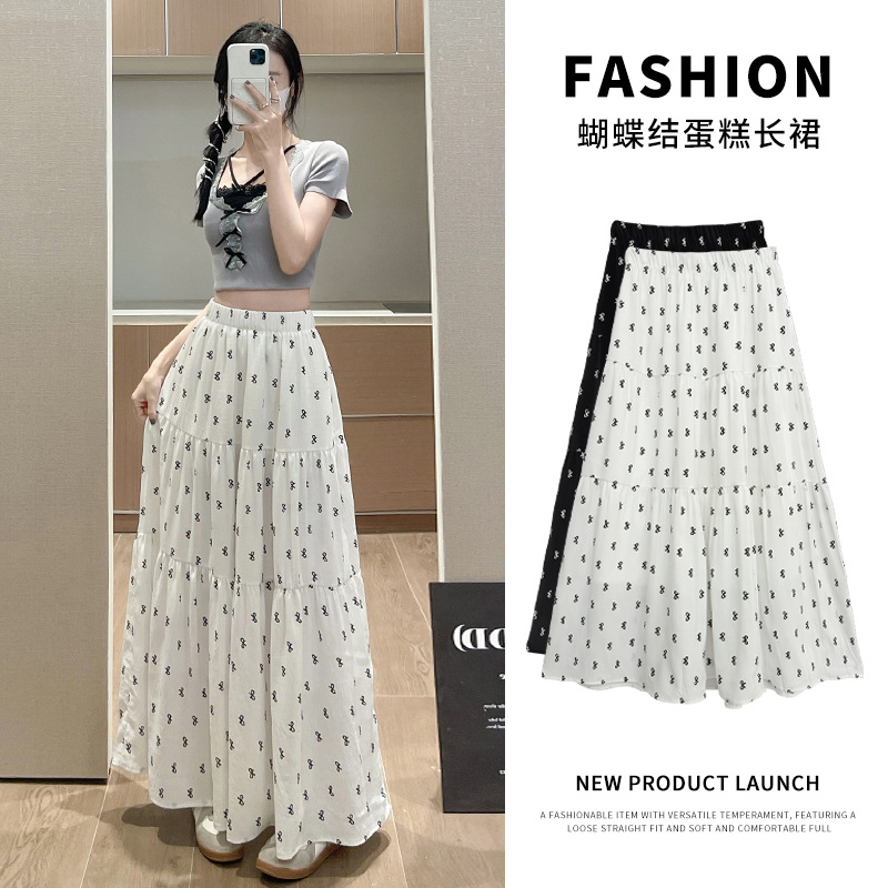 法式温柔风蝴蝶结印花蛋糕裙女春夏新款宽松A字大裙摆遮肉半身裙