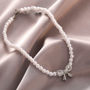 senspe temperament pearl Xia necklace design bow clavicl Xin