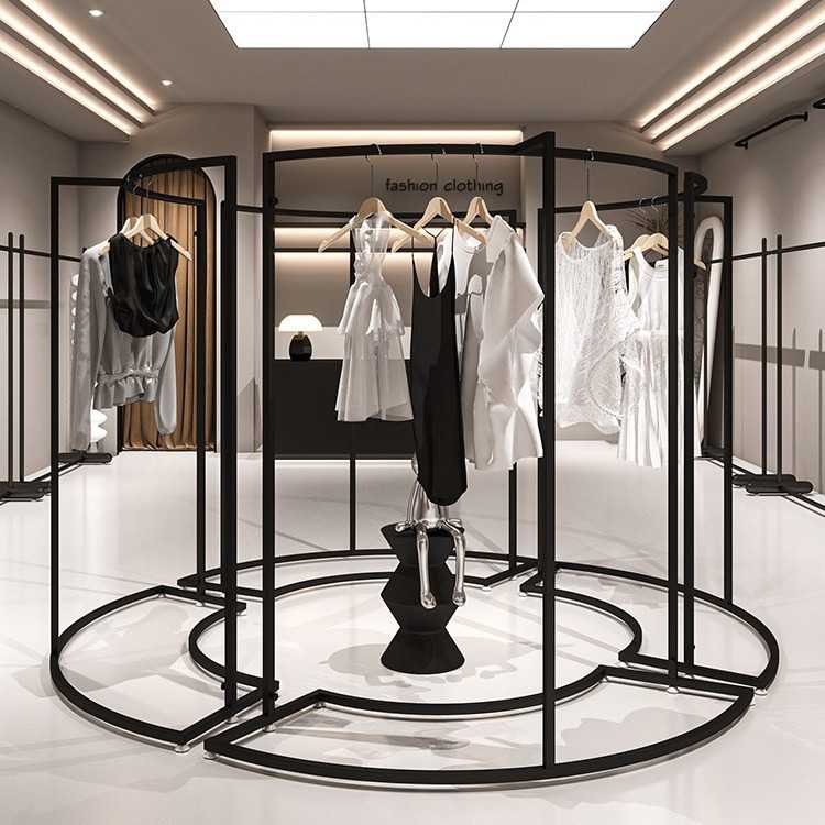 服装店弧形中岛货架中间摆放铁艺黑色陈列架组合女装店衣服展示架