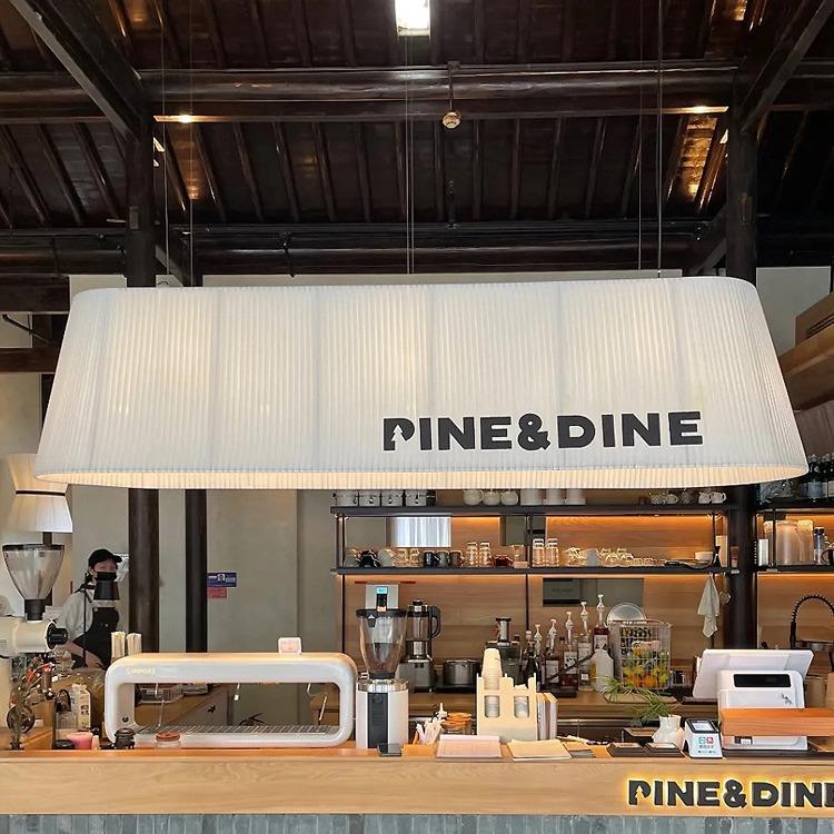 蛋糕咖啡厅奶茶店餐饮前服务收银吧台长条现代简约椭圆形布艺吊灯