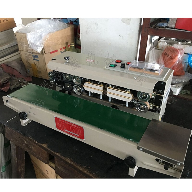 900 连续式封口机 日用百货热封机E 自动塑料薄膜封口机自动封口