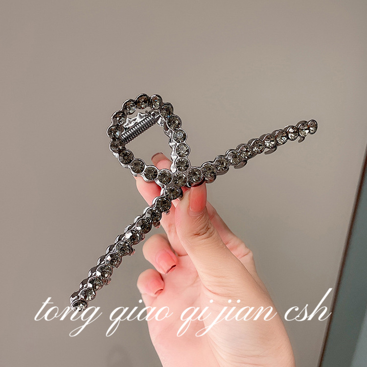 亮镶钻又字交叉抓夹黑色仙女爆闪