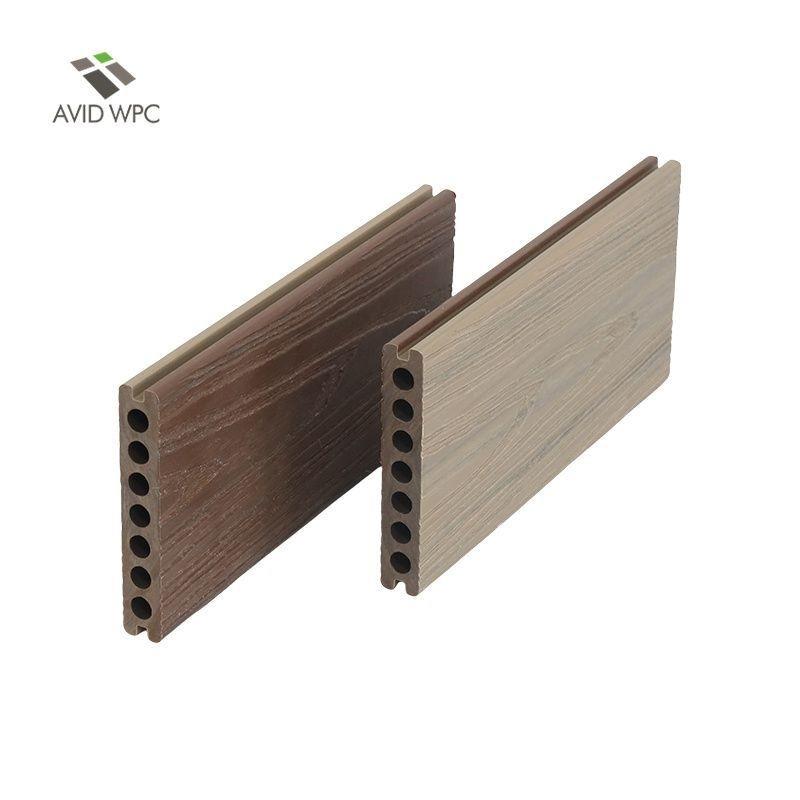 厂家快速定制二代共挤圆孔双色防腐木拼接家用木塑户外pe地板可议