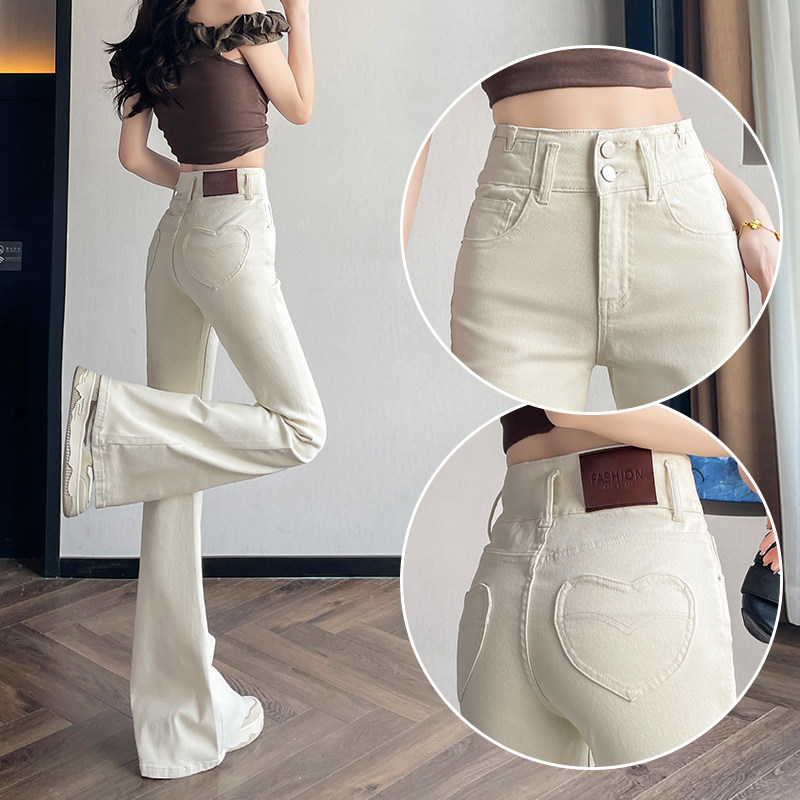 白色美式蜜桃微喇牛仔裤女士冬季加绒加厚设计感弹力提臀马蹄裤子