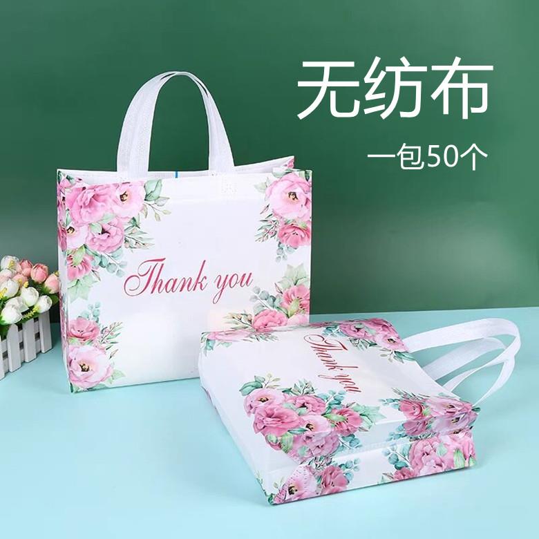 新款覆膜无纺布衣服装店手提拎购物百货化妆礼品塑料袋子包邮