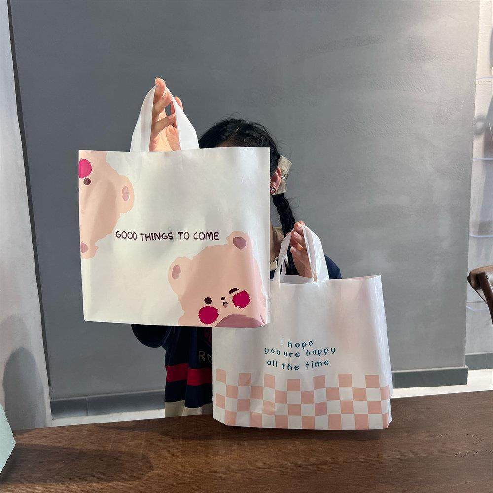 塑料儿童女装服装店用服饰手提袋子包装礼品卡通可爱定制logo高档