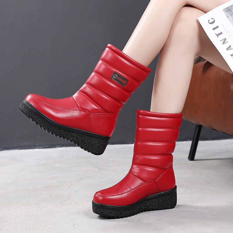 真皮雪地靴女冬季2021新款防滑厚底棉鞋加厚加绒防V水皮面中筒靴