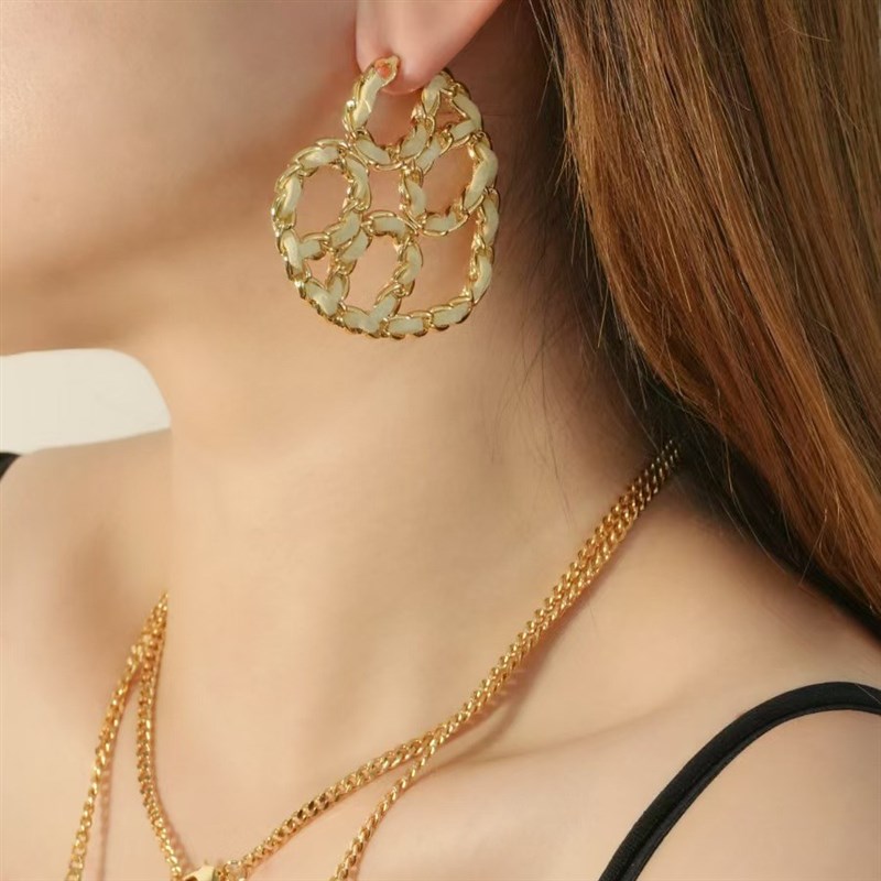 COC圆心S92j5银针铜合金手工编织鹿皮爱心耳环轻奢小众设计高级感