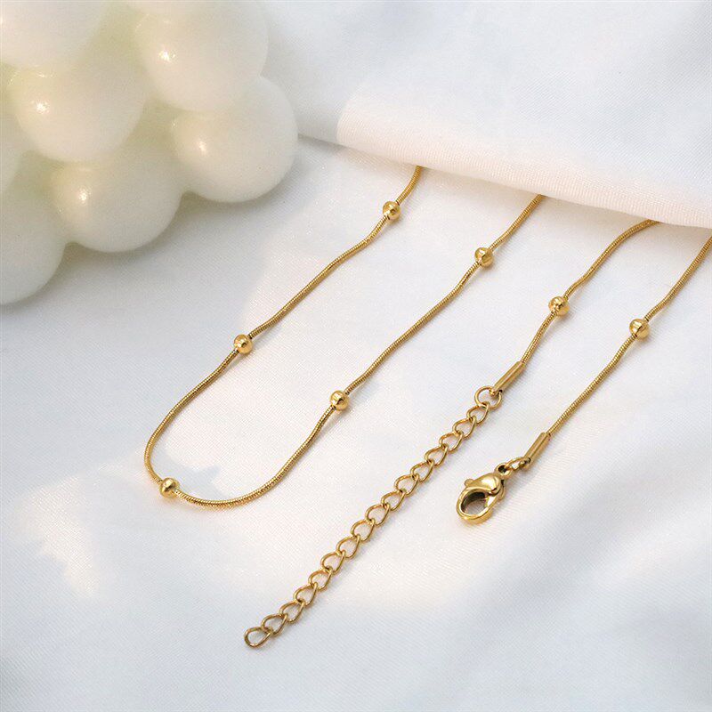 欧美热销ins风钛钢锁骨链女高级感E轻奢18k金间珠蛇骨链项链饰品