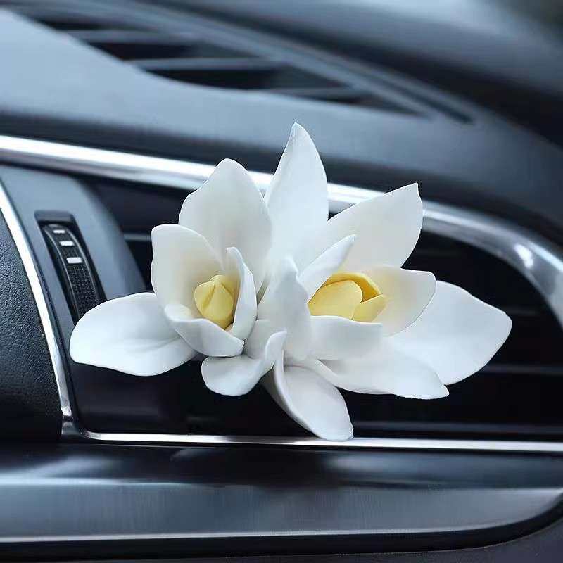 车载陶瓷兰花香薰车内空调出风口空气清新香氛扩香石香薰摆件