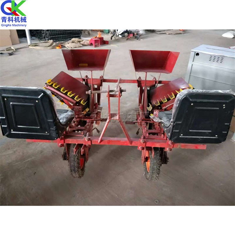 供应拖拉机牵引大葱移栽器 双行葱苗栽种机 农用座驾式种葱机