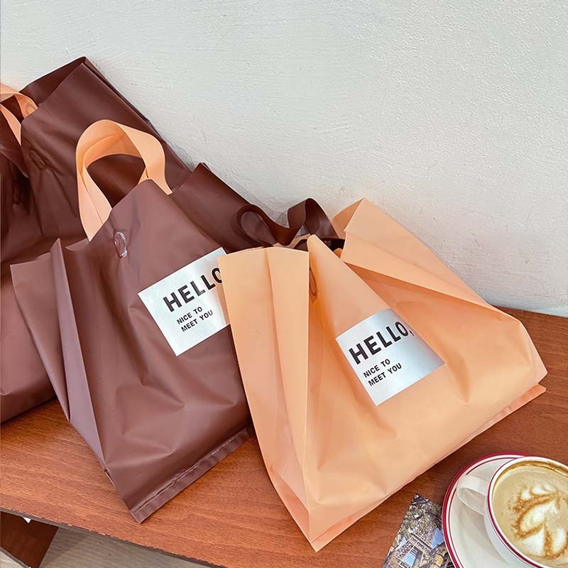现货春款服装店手提袋子装包装购物塑料袋定制礼品打包带礼袋