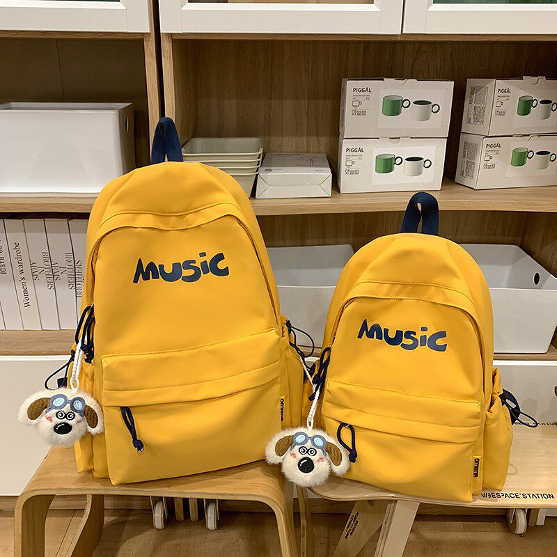 美式高街书包初中生男生小众高颜值双肩包小学生大容量减负背包女