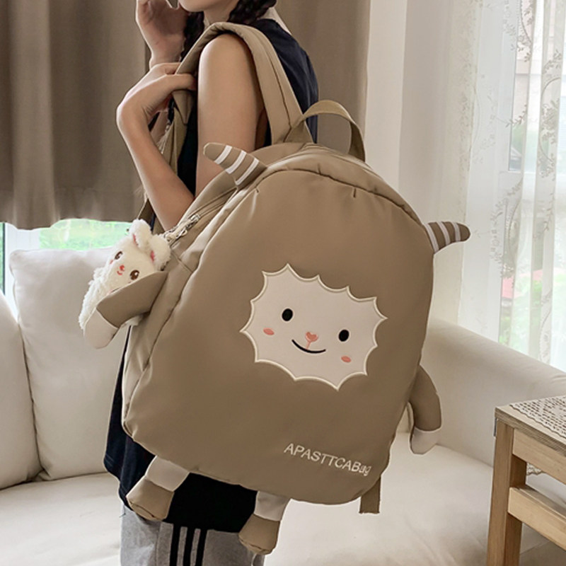 日系少女书包新款韩版可爱小羊双肩包女童卡通小学生初中背包女孩